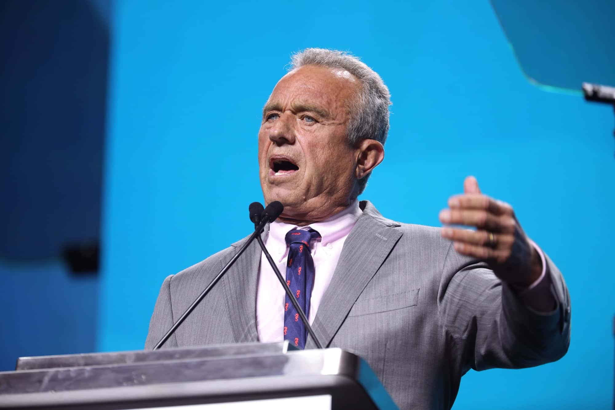 Robert F. Kennedy Jr. speaking at a podium